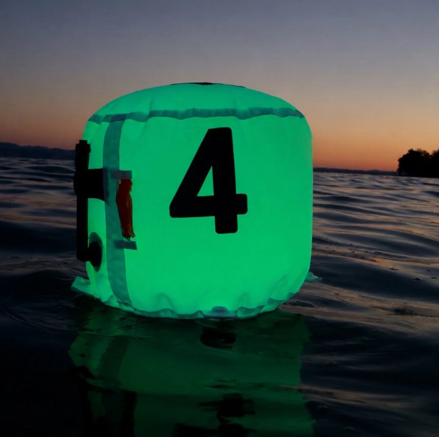 XP FROQ marking buoy on the water at dusk